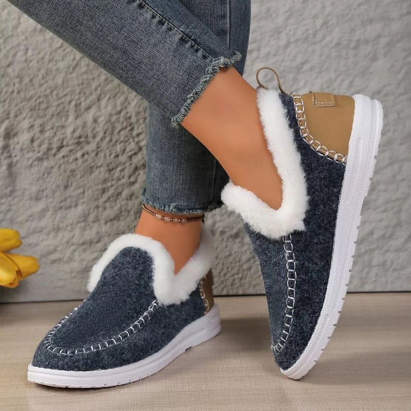 Dark blue fuzzy slip-on shoes with thick white plush collars