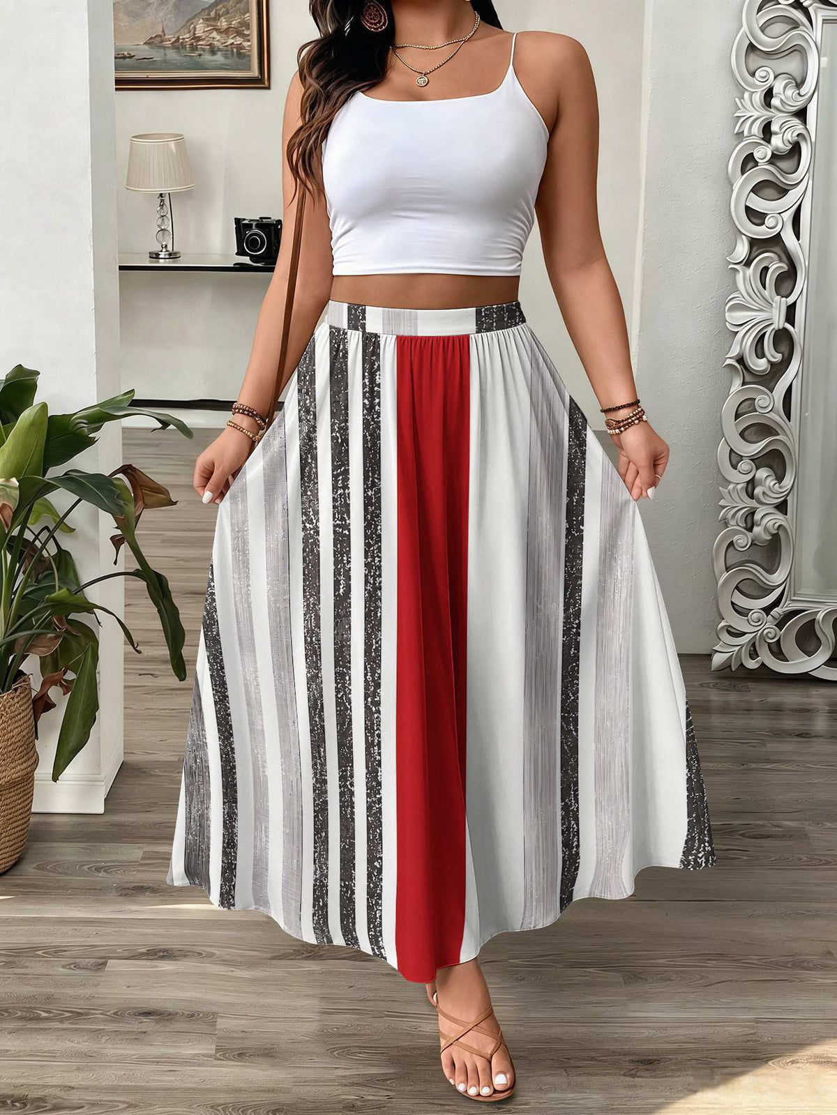 Close-up of Scarlet Stripe Maxi Skirt showing textured grey and red panel detail