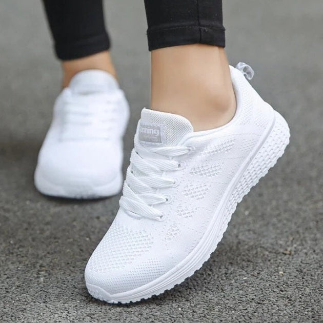 All-white knit mesh sneakers with textured white sole for everyday wear