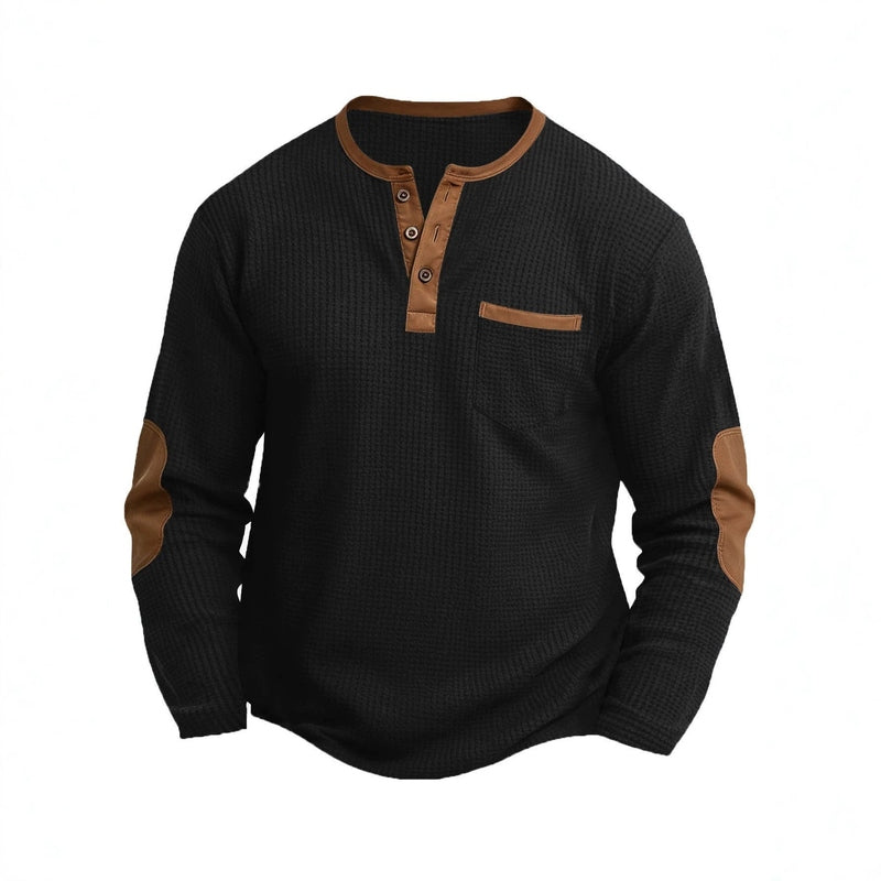 Black waffle-knit long sleeve henley shirt with brown contrast trim on collar and placket
