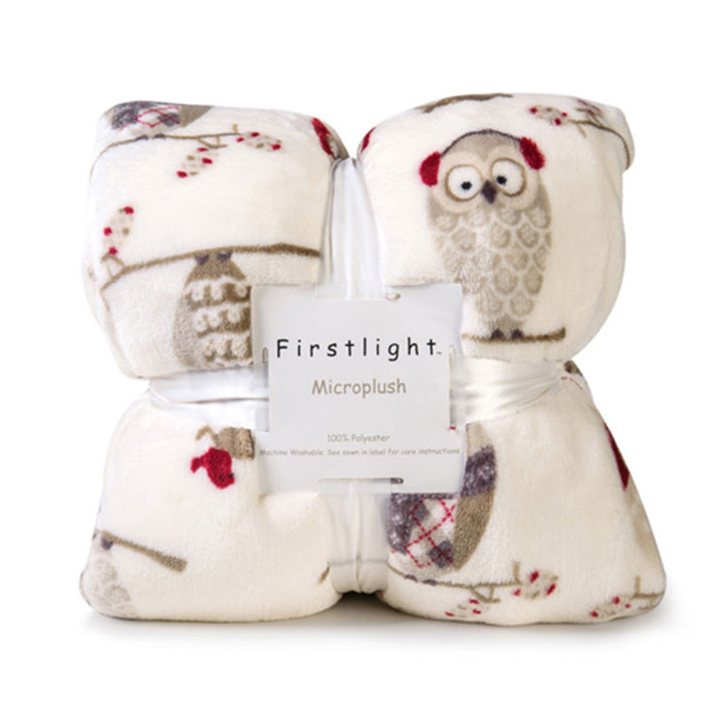 Owl-print cream microplush throw blanket secured with ribbon tag