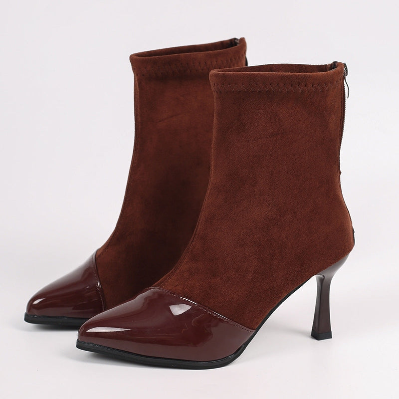 Dark brown stretch shaft boots with glossy pointed toe and stiletto heel