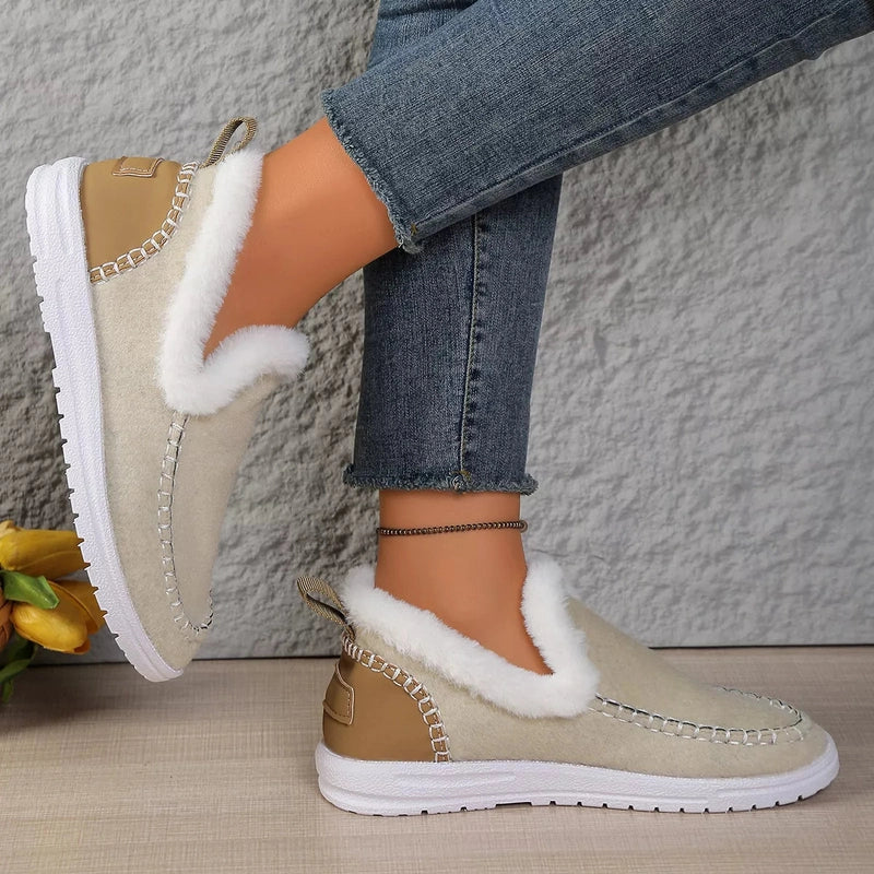 Beige cozy flat shoes with fluffy lining and decorative stitching