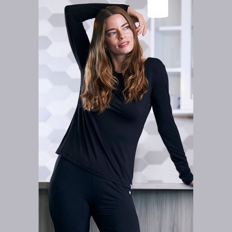 Black women's bamboo lounge scoop neck top and matching pants on model