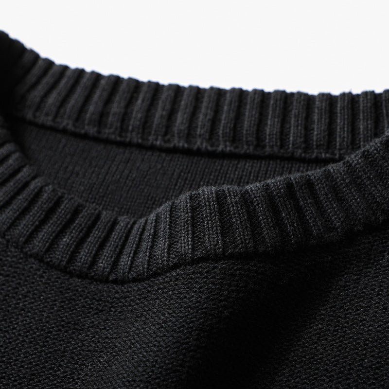 close up detail of sweater neck line and stitching fabric detail