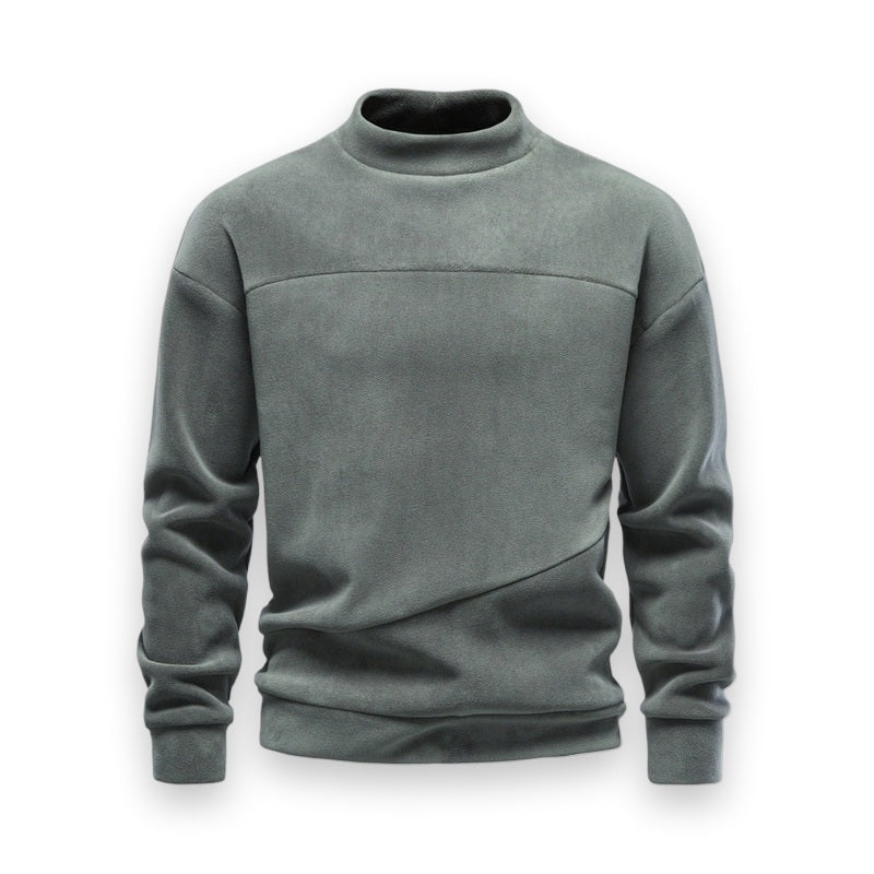 Front view of olive green half-collar sweatshirt emphasizing relaxed fit and angled stitching