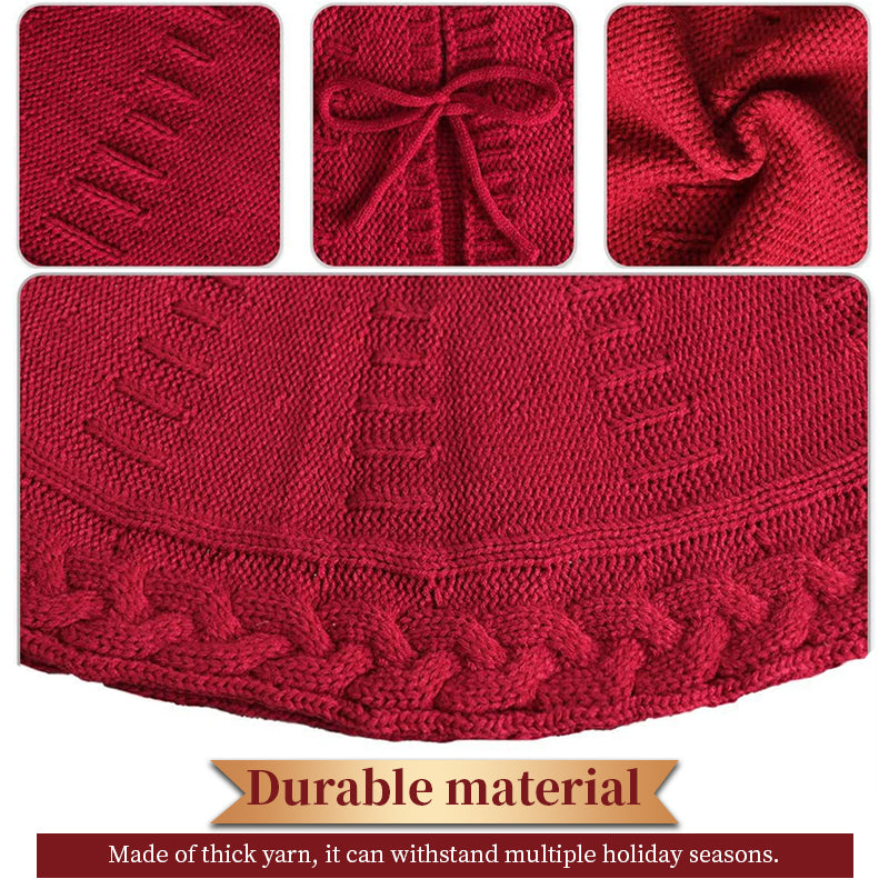 Close up of red knitted tree skirt showing thick yarn texture and cable stitch