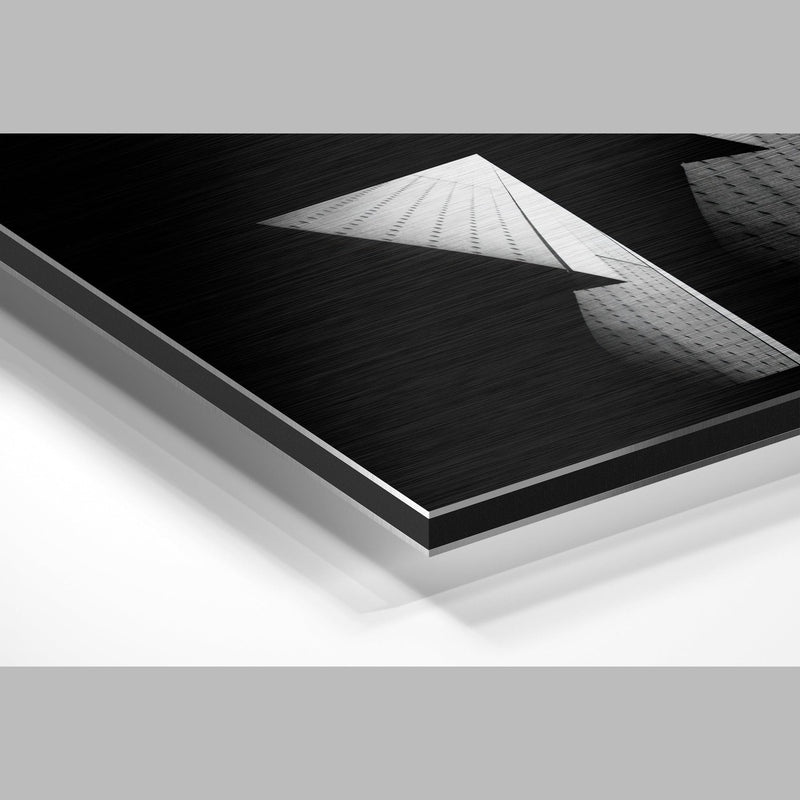 Black and white geometric building metal wall art angled edge view