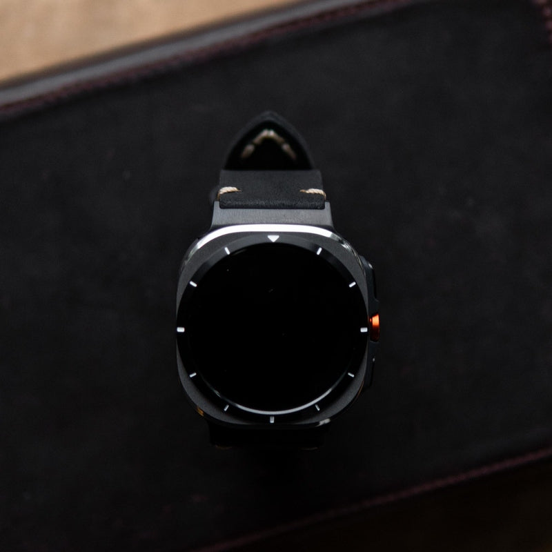 Back view of smartwatch showing embossed Robust branding on leather strap