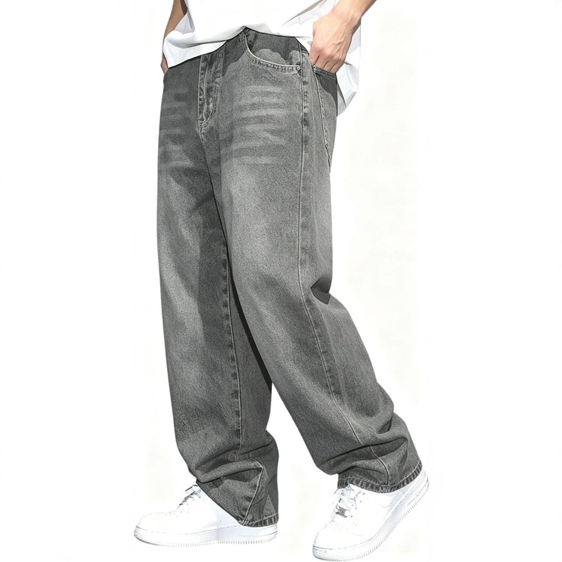 Men's gray washed jeans with loose wide-leg silhouette and horizontal distressing