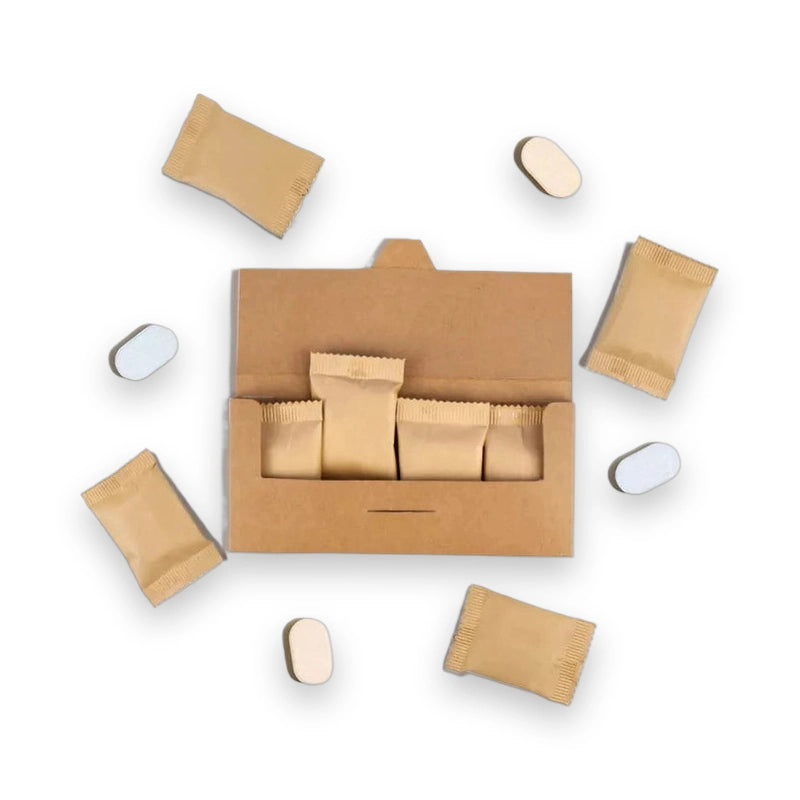 Open Eco Tab hand soap refill box showing wrapped tablets and loose bars