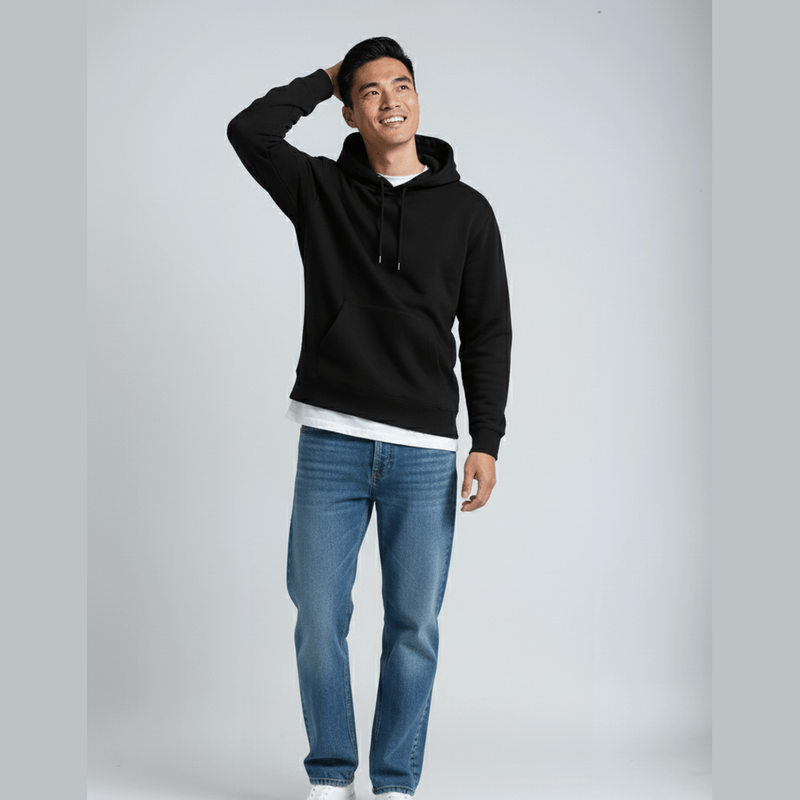 Layered black pullover hoodie over white t-shirt for casual style