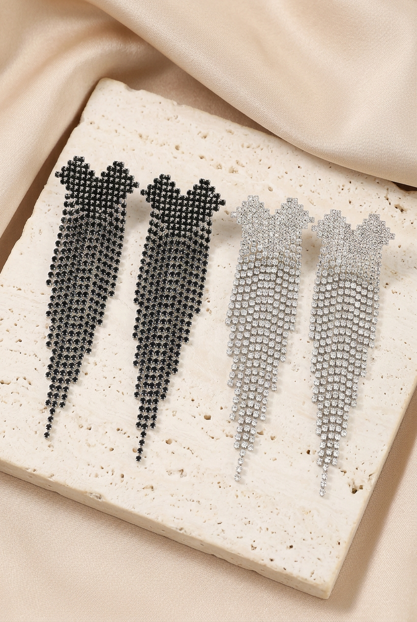 Black and clear fringe earrings styled together