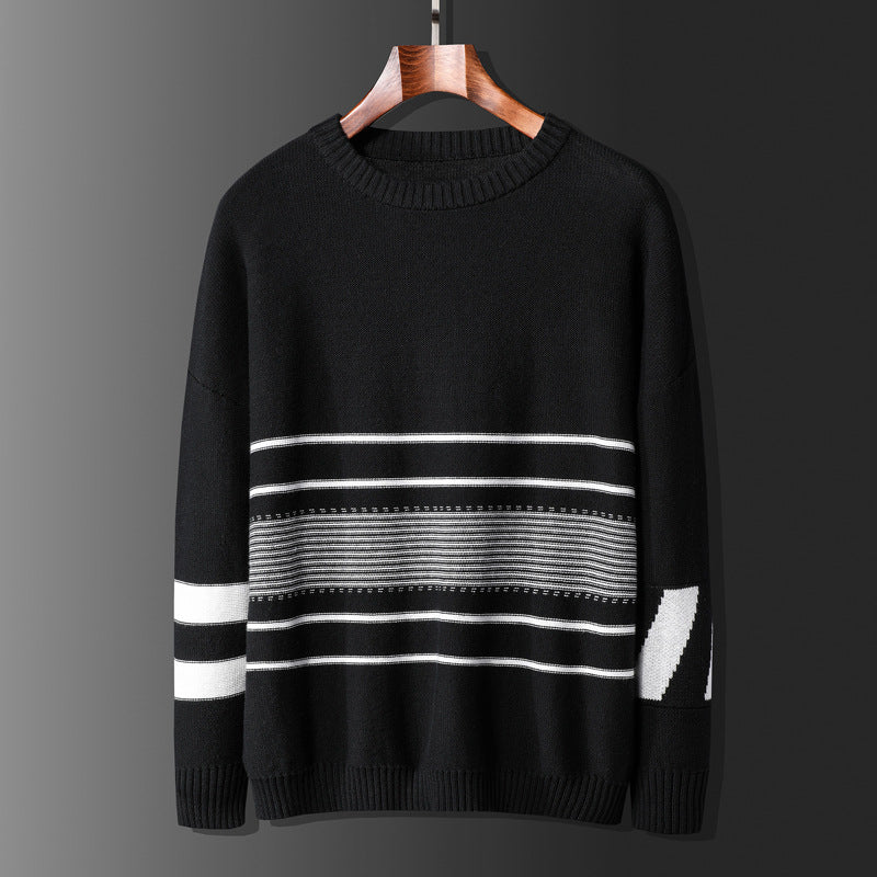 Black sweater with white stripes in a darken background