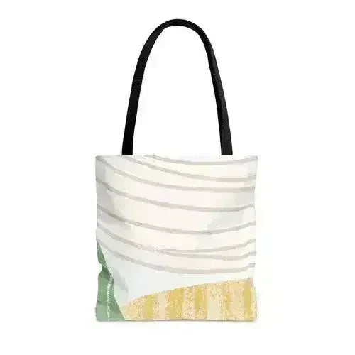 Front view of large tote bag with curved grey brushstrokes and green yellow details