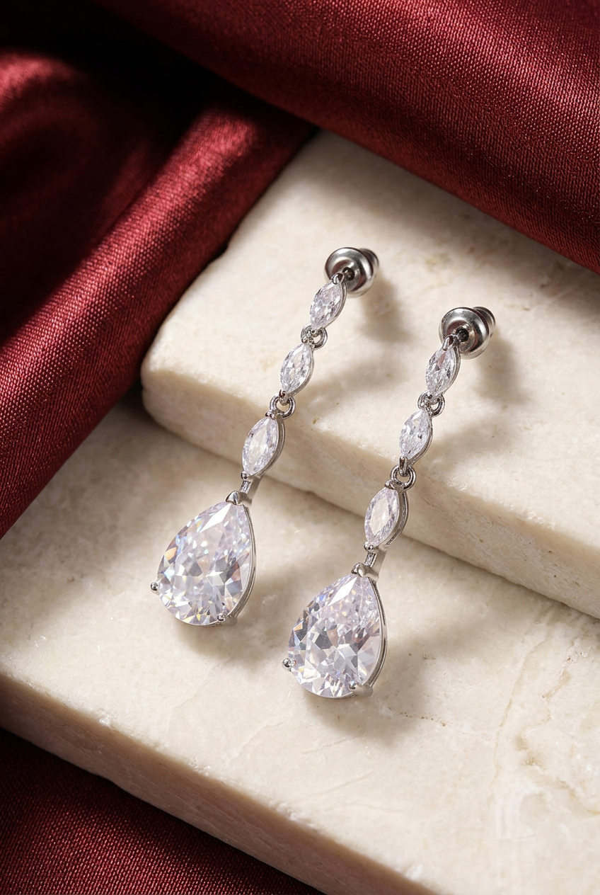 Close-up of the clear pear-shaped stones and marquise links