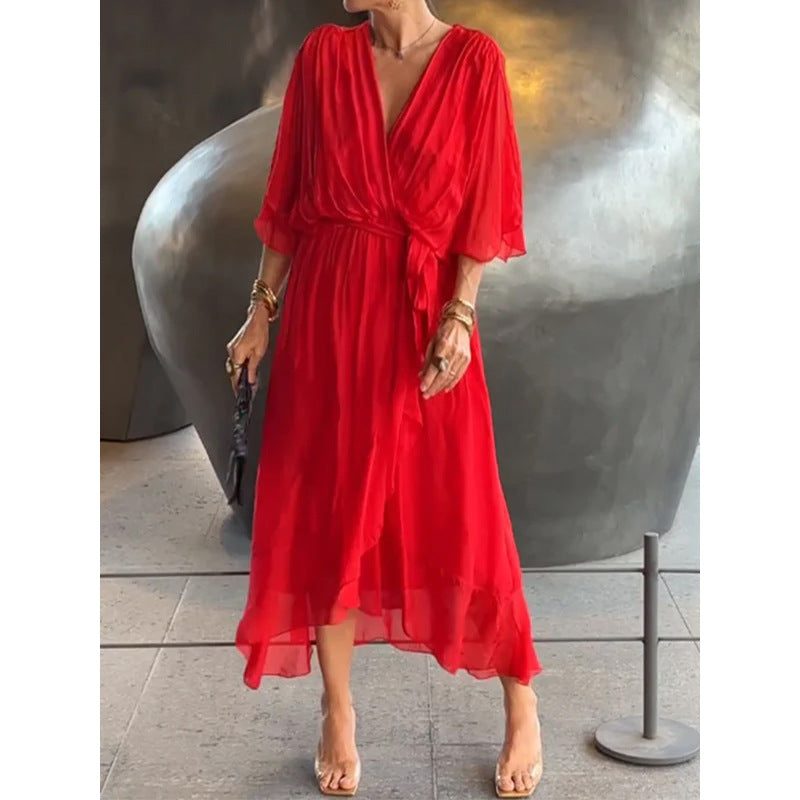 Red irregular hem maxi dress with loose batwing sleeves on model