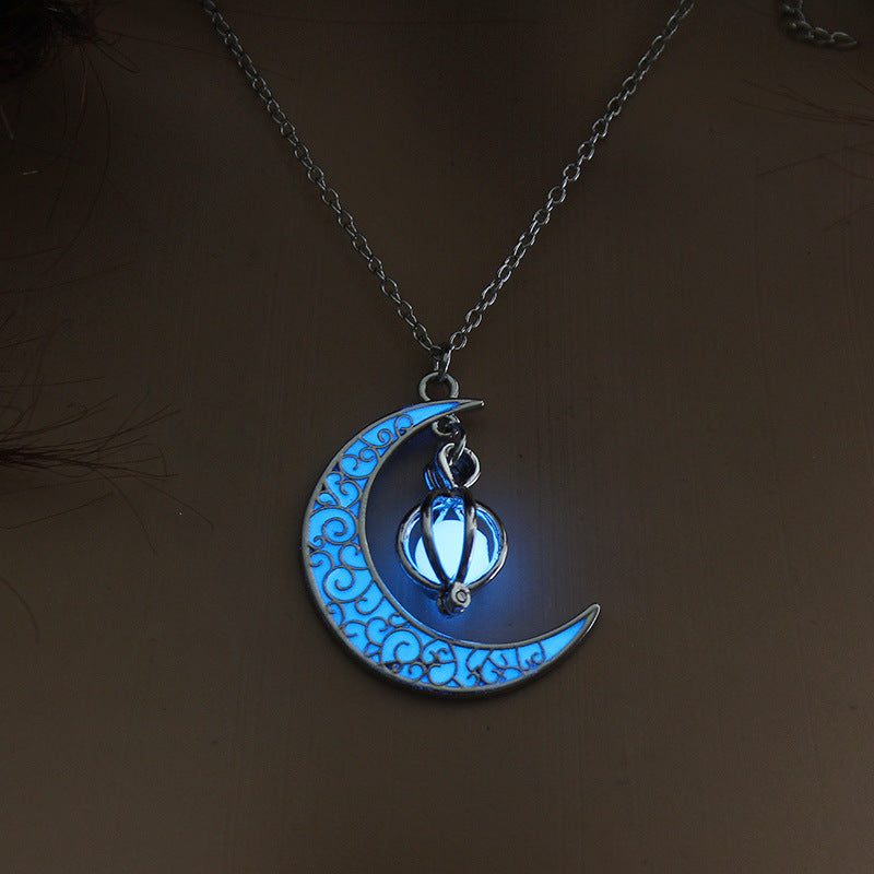 Electric blue glowing pumpkin pendant necklace worn against skin