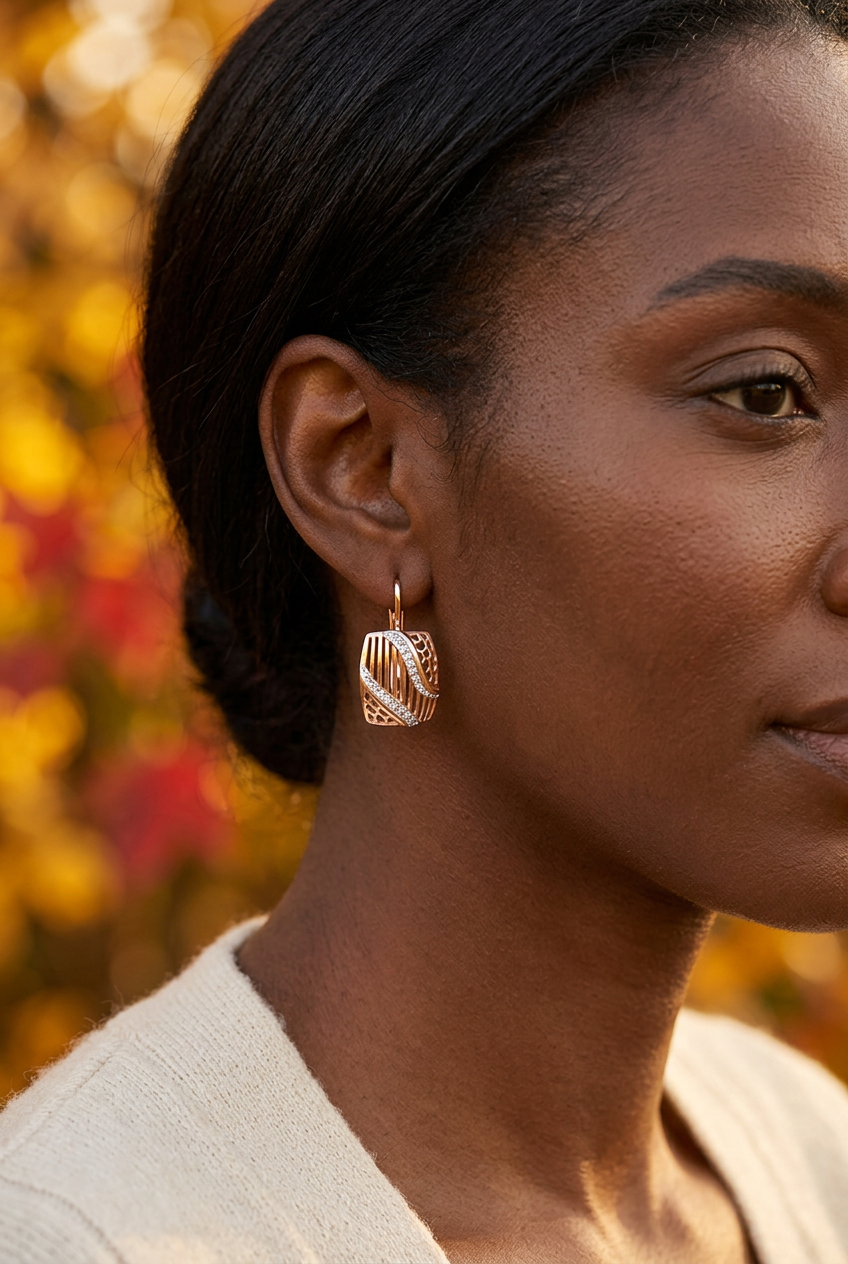 Model wearing the curved openwork earring design