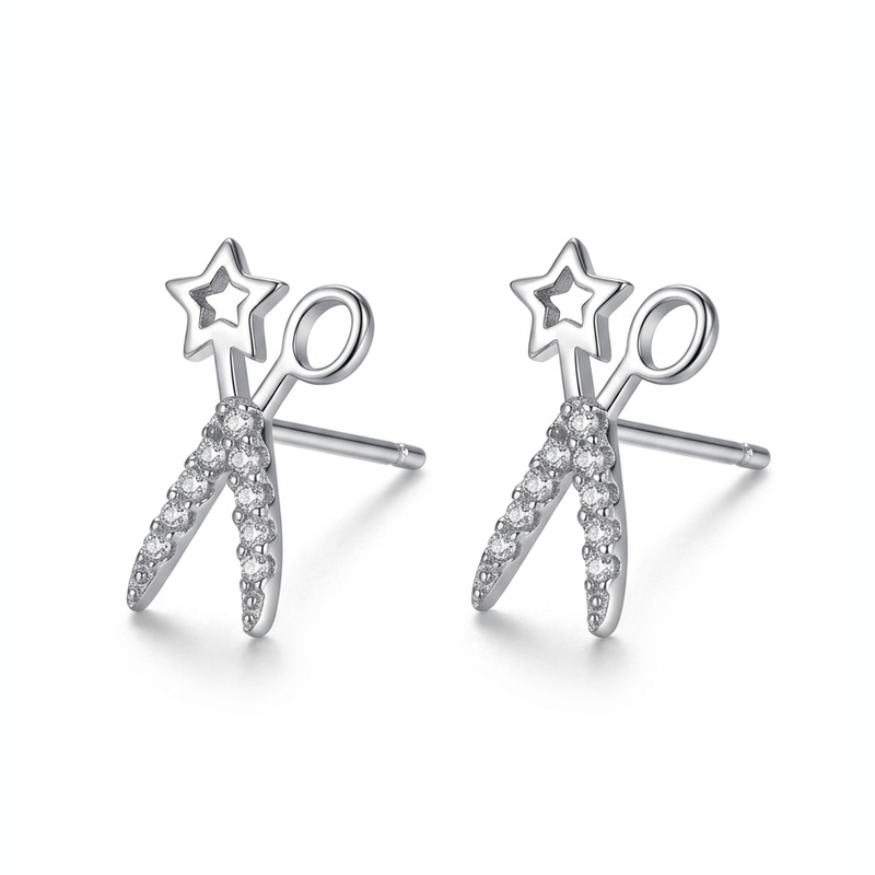 Scissor-shaped stud earrings on a clean white background