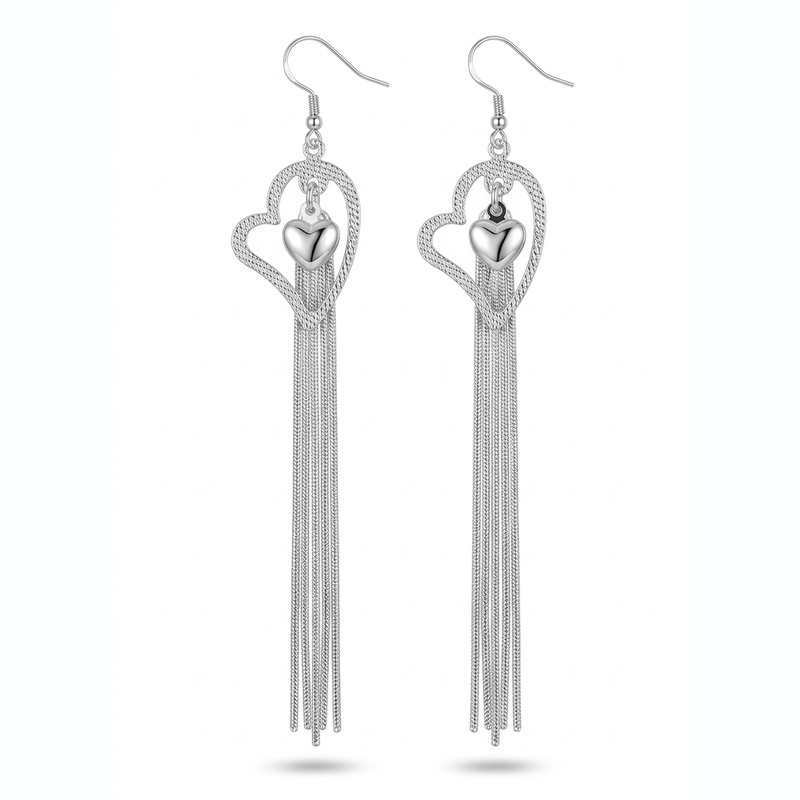 Silver-tone heart tassel earrings on a white background
